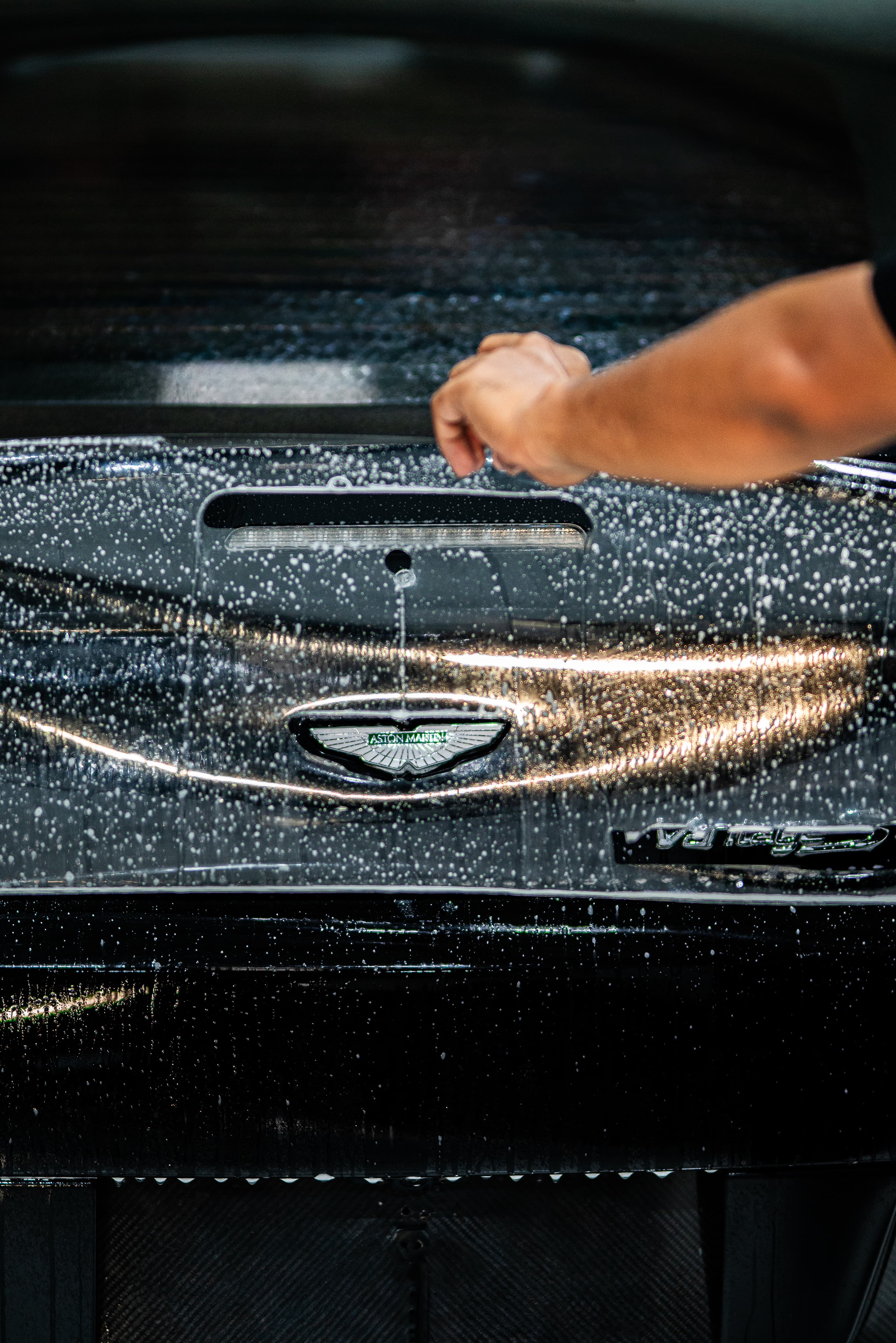 Close-up of a vehicle badge with paint protection film installed at ASV Phantom Dubai
